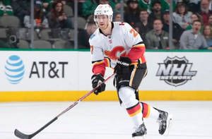 Dougie Hamilton Deftly Handling The Puck Against The Dallas Stars Wallpaper
