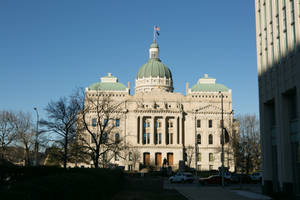 Downtown Indianapolis Skyline Featuring The Indiana State Capitol Wallpaper