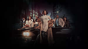 Dramatic Cast Posewith Car Wallpaper