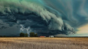 Dramatic View Of A Tornado In A Stormy Weather Wallpaper