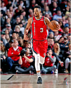 Dribbling Cj Mccollum In Focus Shot Wallpaper