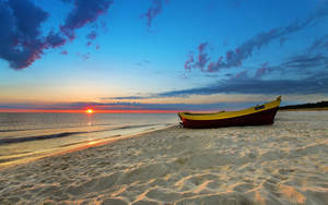 Dry Docked Boat On White Sand Wallpaper