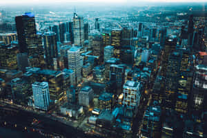 Dusk Cityscape Skyscrapers Lights Wallpaper