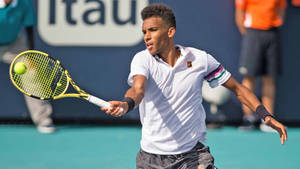 Dynamic Forehand Stroke By Felix Auger-aliassime Wallpaper