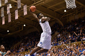 Dynamic Nba Star Zion Williamson On The Court Wallpaper