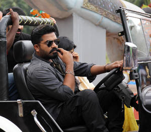 Dynamic Simbu Deep In Focus At A Behind-the-scenes Shoot Wallpaper