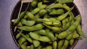 Edamame Beans In A Black Bowl Wallpaper