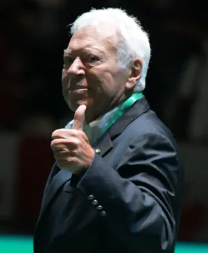 Elderly_ Gentleman_ Giving_ Thumbs_ Up Wallpaper