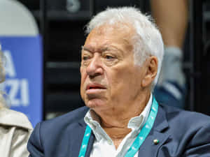 Elderly_ Man_ At_ Event Wallpaper