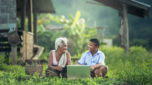 Elderly Woman And Student Wallpaper