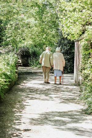 Elderly Woman Walking Together Wallpaper