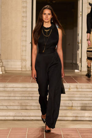 Elegance And Style With Ralph Lauren Sleeveless Black Pants Wallpaper