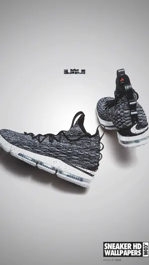 Elegant Lebron 15 Gray Sneaker Showcased On White Background Wallpaper