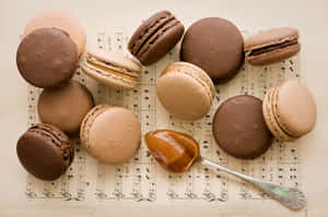 Elegant Neutral Colored Tasty Macaron Wallpaper