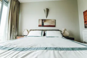 Elegant White Bedroom With Gray Accents Wallpaper