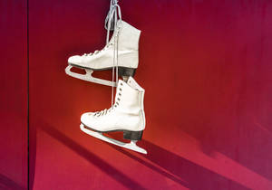 Elegant White Ice Skating Shoes Wallpaper