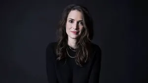 Elegant Winona Ryder In Formal Attire Wallpaper