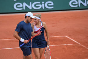 Elena Vesnina Talking To Aslan Karatsev Wallpaper