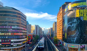 Elevated Metro Line Against The Skyline Of Taipei, Taiwan Wallpaper