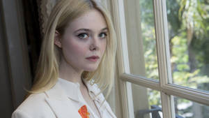 Elle Fanning Near The Window Wallpaper