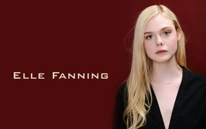 Elle Fanning Staring Blankly Wallpaper