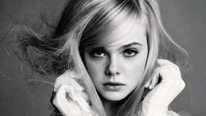 Elle Fanning Staring Fearlessly Wallpaper