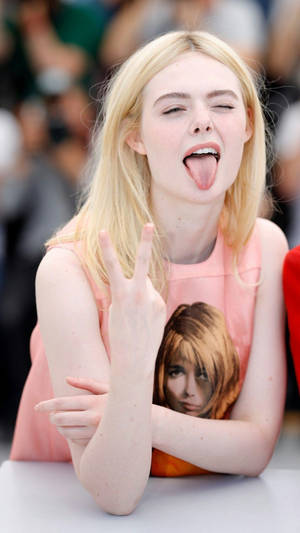 Elle Fanning Wacky Pose Wallpaper