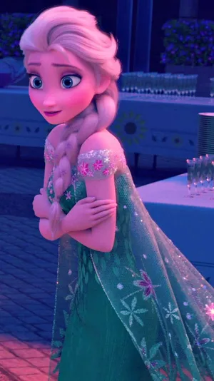 Elsa In A Green Dress Standing In Front Of A Table Wallpaper