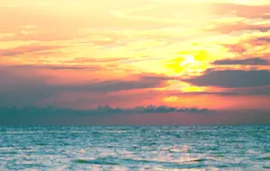 Embrace A Beach Aesthetic With This Serene Scene Wallpaper