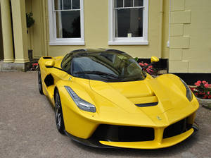 Embrace The Power Of The Ferrari Laferrari Wallpaper