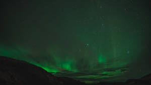 Emerald Green Aurora In Sky Wallpaper