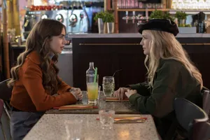 Emily And Camille Share A Special Moment In Paris Over Lunch Wallpaper