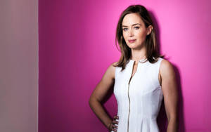 Emily Blunt In Cute Pink Wallpaper