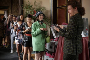 Emily In Paris Looking Chic In Her Green Outfit Wallpaper