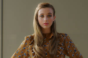 Emma Chamberlain Brown Hair And Blouse Wallpaper