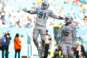 Emmanuel Ogbah Miami Dolphins Jump Wallpaper