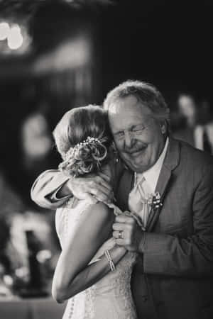 Emotional Wedding Hug Wallpaper