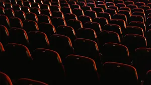 Empty Cinema Seats Dark Ambience Wallpaper