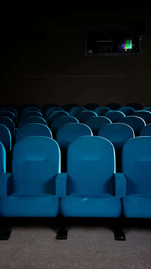 Empty Cinema Seatswith Projection Window Wallpaper