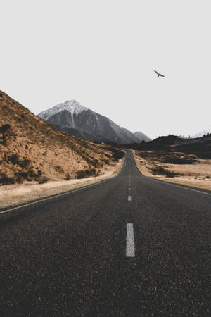 Empty Road On Deserted Land Wallpaper