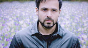 Emraan Hashmi In Flower Field Wallpaper