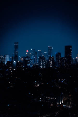 Enchanting Nighttime Metropolis Wallpaper