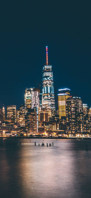 Enchanting View Of New York Skyline At Night Wallpaper