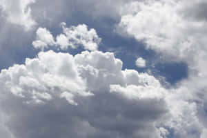 Endless Whites Skies Surrounding By Beautiful White Clouds Wallpaper