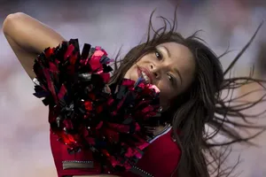 Energetic Cheerleaders In Action Wallpaper