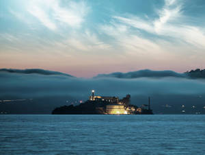 Enigmatic Alcatraz Island Under The Starlit Sky Wallpaper