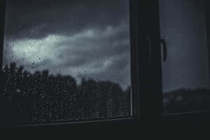 Enjoy A Beautiful Day While Appreciating The Calming Rain Wallpaper