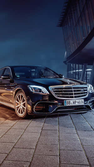 Enjoy A Sophisticated Experience With Mercedes Classic Iphone Wallpaper