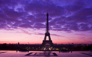 Enjoy A Vibrant Night In Paris, France Wallpaper