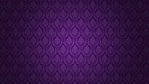 Enjoy An Inspired Workspace With This Playful Purple Desktop Wallpaper